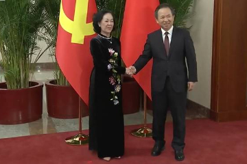 中共中央组织部部长同越共中央组织部部长举行会谈