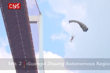 Parachutists worldwide leap from Baling River Bridge