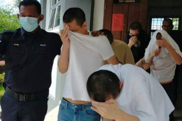 专骗新加坡人 五中国人在马来西亚认罪