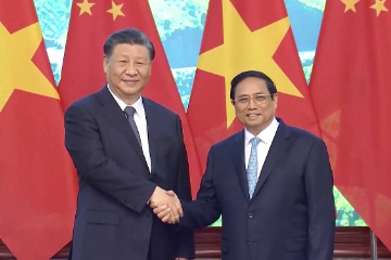 中国国家主席习近平会见越南总理范明政