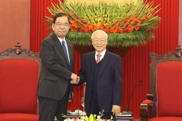 越共中央总书记阮富仲会见日本共产党代表团